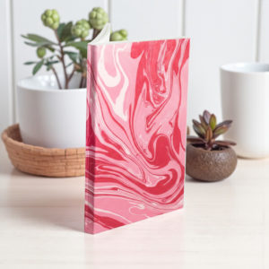 Cuadernos de mármol rosado