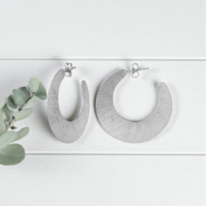 Aretes de media luna